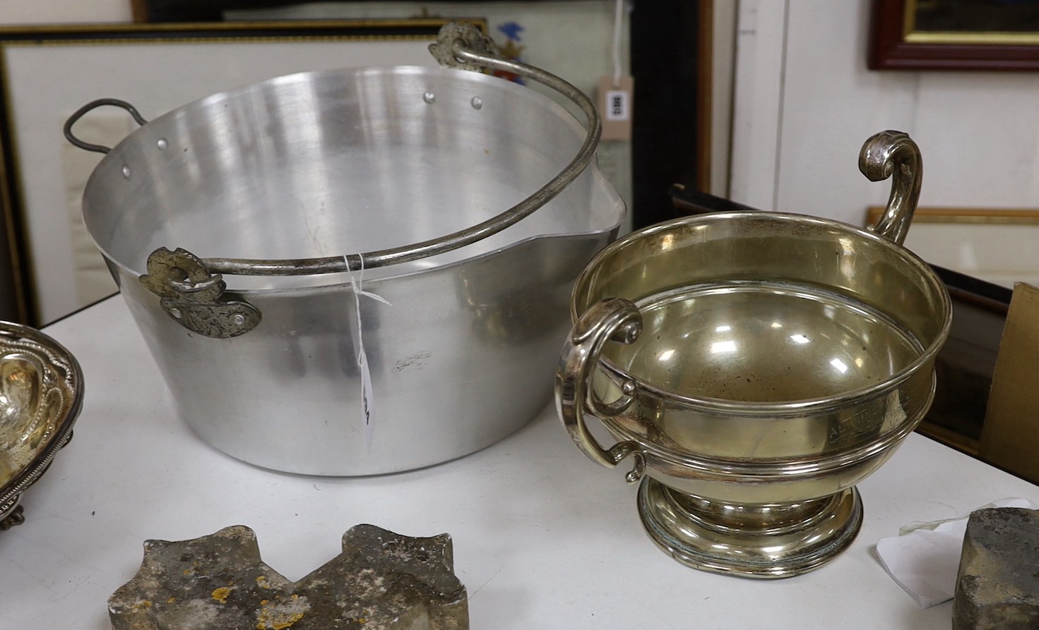 A group of assorted metalwares including plated wares, irons, scales, miniature candlesticks etc.